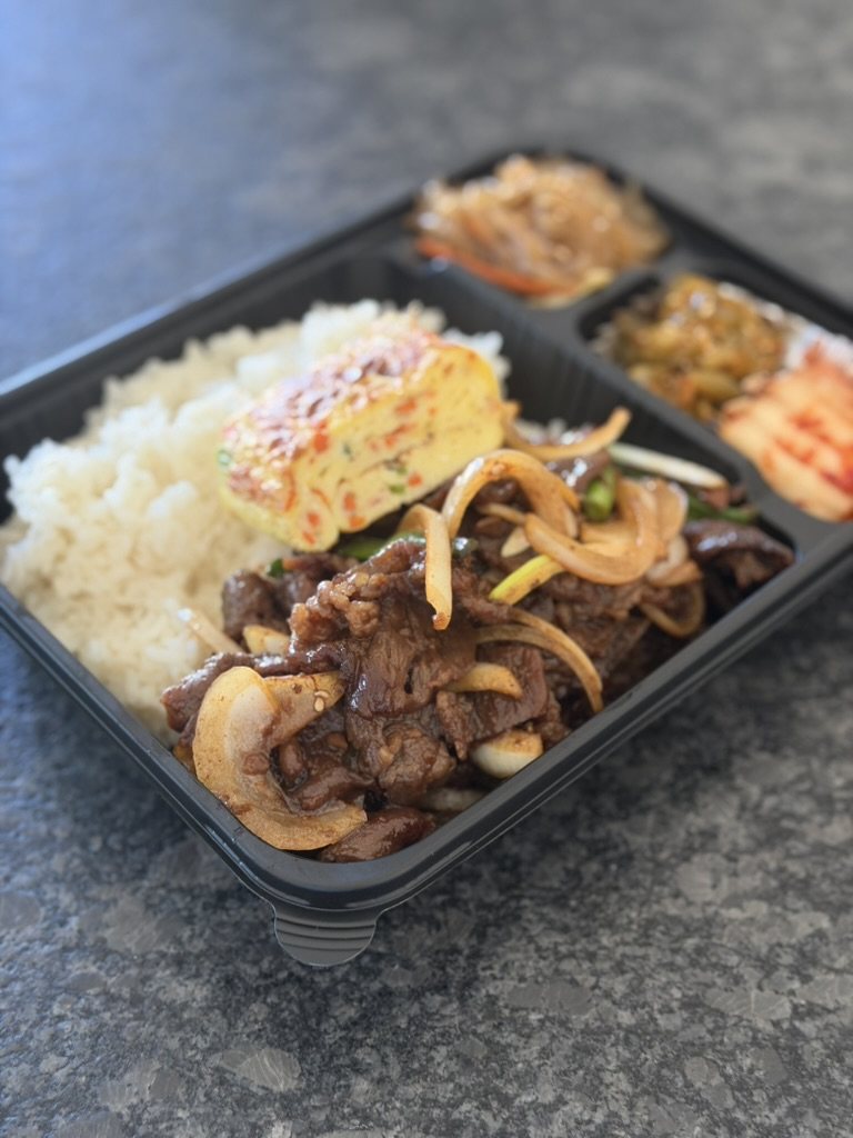 Bulgogi plain set: beef and onions, rice, egg roll and three small banchan in one tray